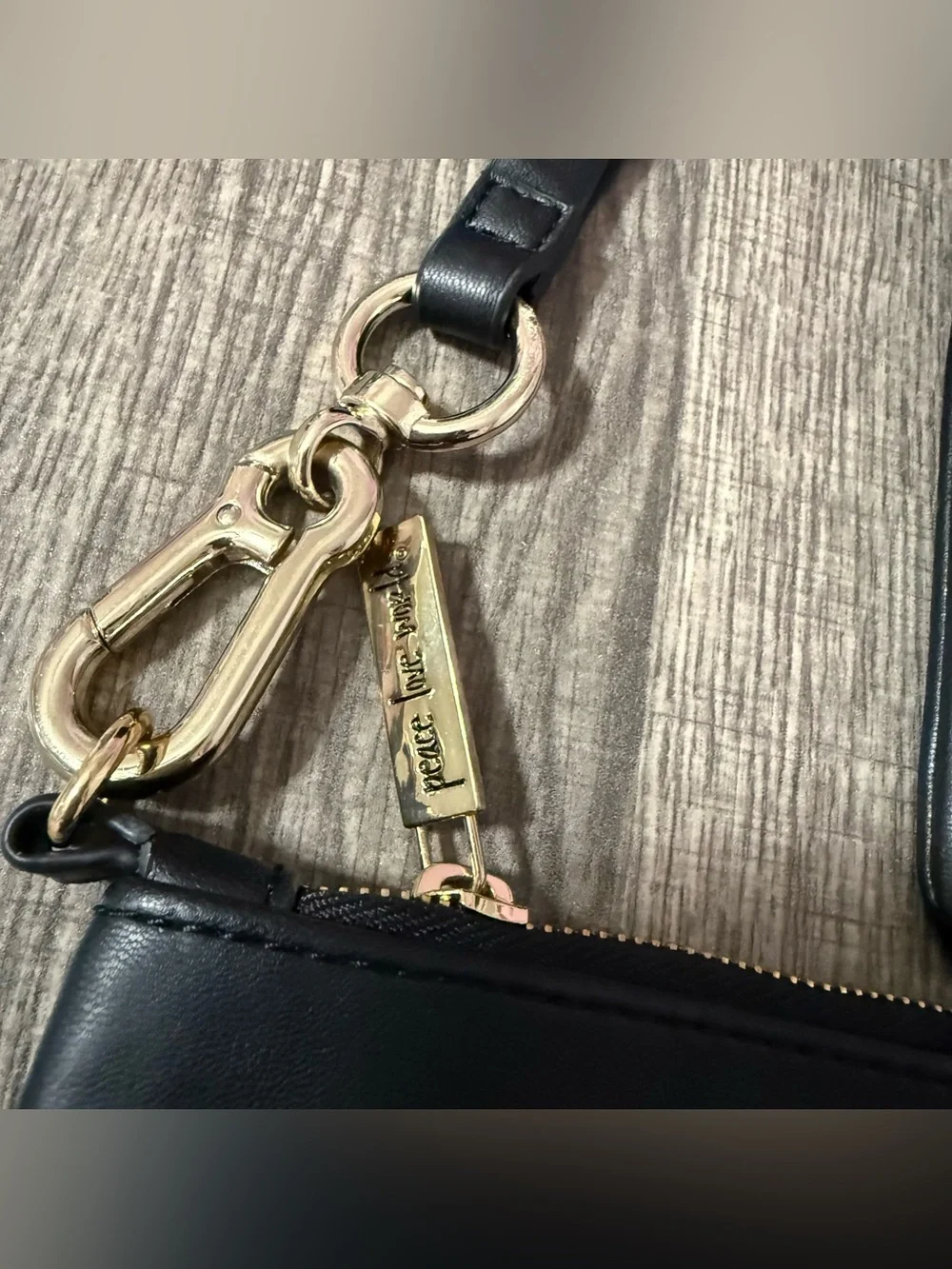 2 Peace Love World Black Embossed Leather Clutch Wristlets